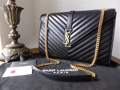 ysl grain de poudre textured leather with gold hardware black|SAINT LAURENT SAINT LAURENT Grain De Poudre Uptown .